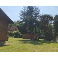 A Charming & Traditional Scandinavian Log Cabin Within A Tranquil Setting.