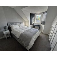 Modern 3-Bedroom Home with Cozy Cinema-Style Living Space