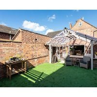 Boutique three storey Georgian Town House ground floor apartment with garden