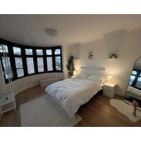 Spacious 4-Bed Home with Big Backyard & Free Driveway Parking