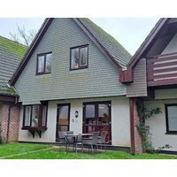 A Beautifully Modernised And Spacious Four Bedroom House Set Amongst The Trees