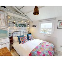 Perched high on the dunes offering a picturesque views that stretch across the landscape