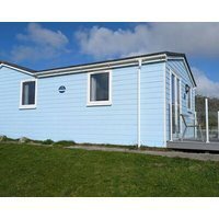 Just off the coastal path with some sea views through to St Ives Bay. Enclosed verandas front and ba